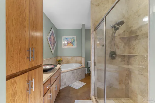 a close view of a utility room with washer and dryer