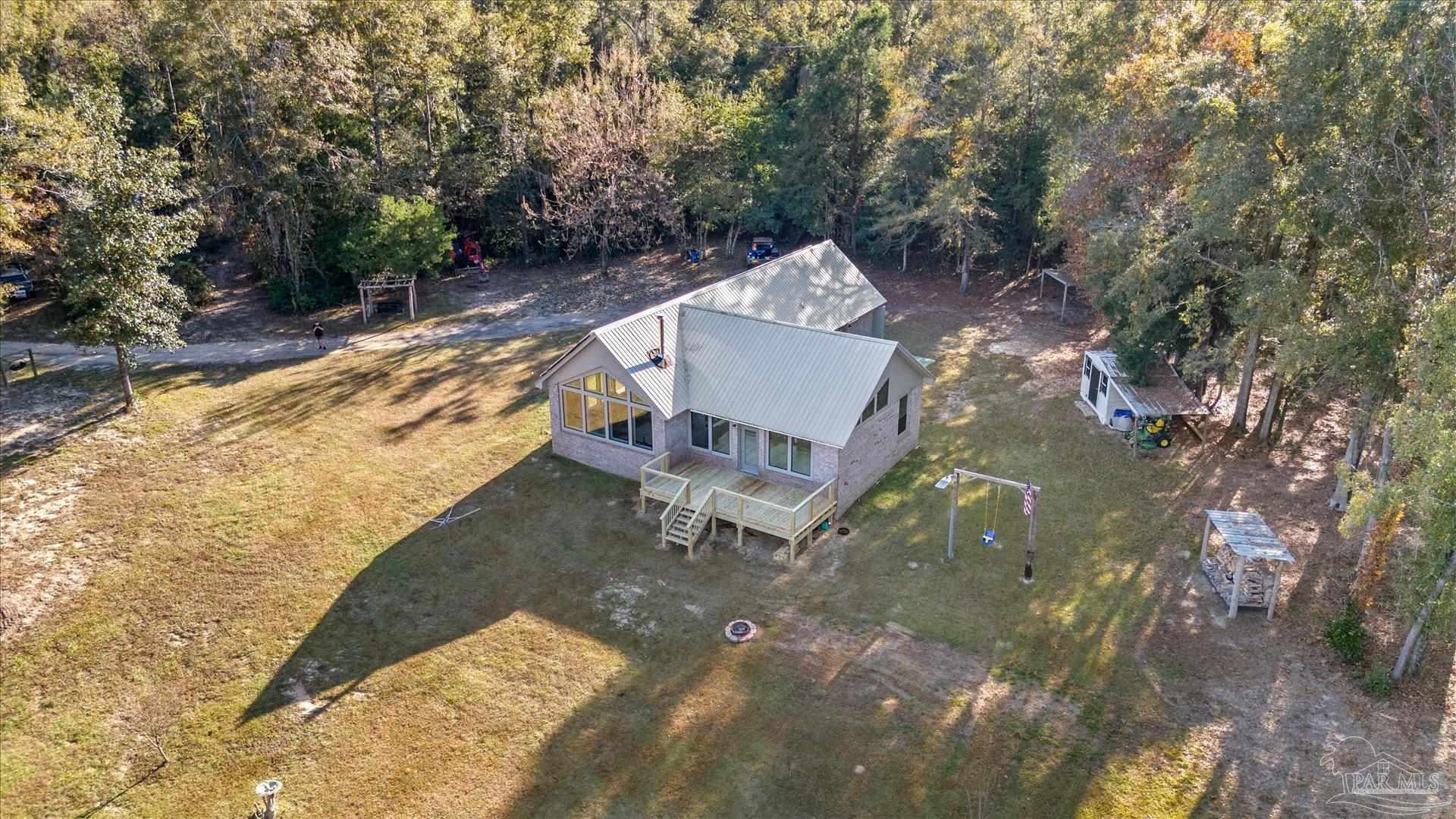 4394 Crabtree Church Road Molino, FL 32577 - Photo 56 of 70 a view of a backyard