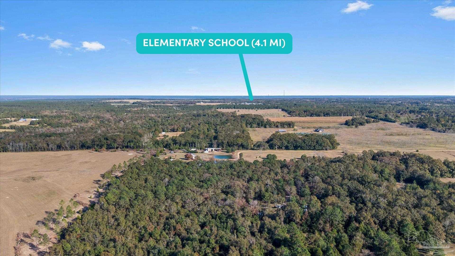 4394 Crabtree Church Road Molino, FL 32577 - Photo 59 of 70 a view of a field with an ocean