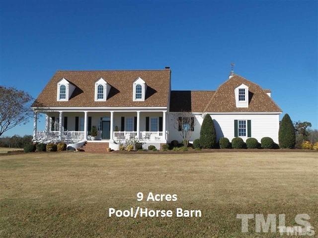 2915 Green Path Road Dunn, NC 28334 - Photo 1 of 24 a front view of a house with a yard