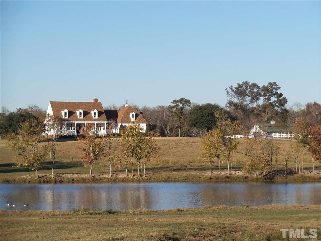 2915 Green Path Road Dunn, NC 28334 - Photo 2 of 24 a view of a lake with houses