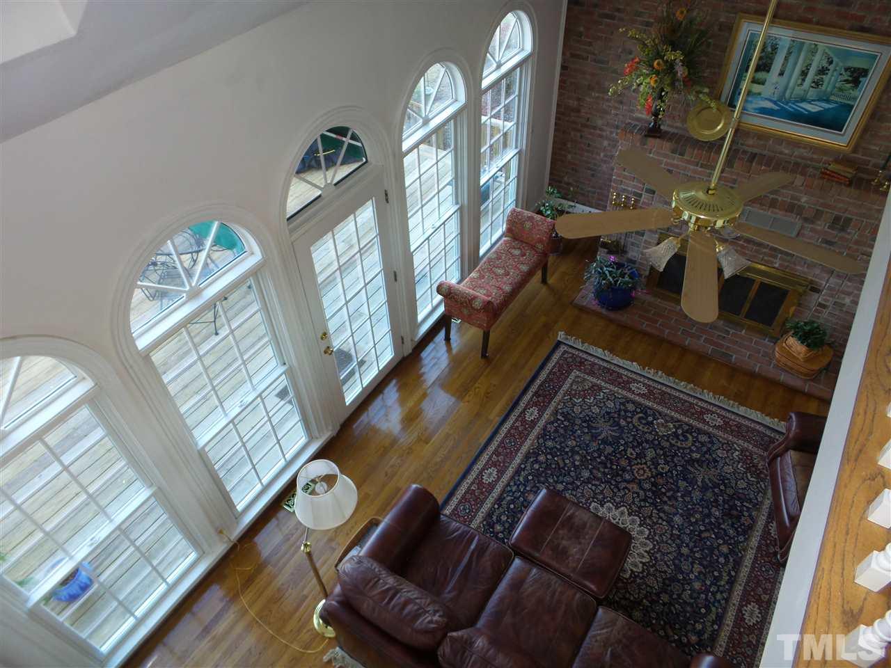 2915 Green Path Road Dunn, NC 28334 - Photo 14 of 24 a living room with furniture and a fireplace
