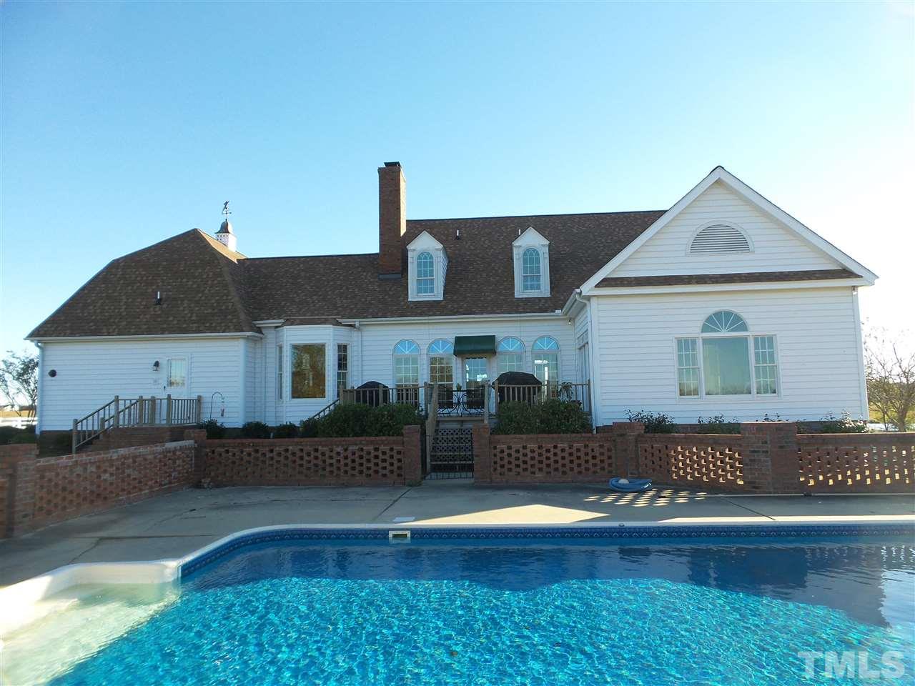 2915 Green Path Road Dunn, NC 28334 - Photo 20 of 24 a front view of a house with a yard