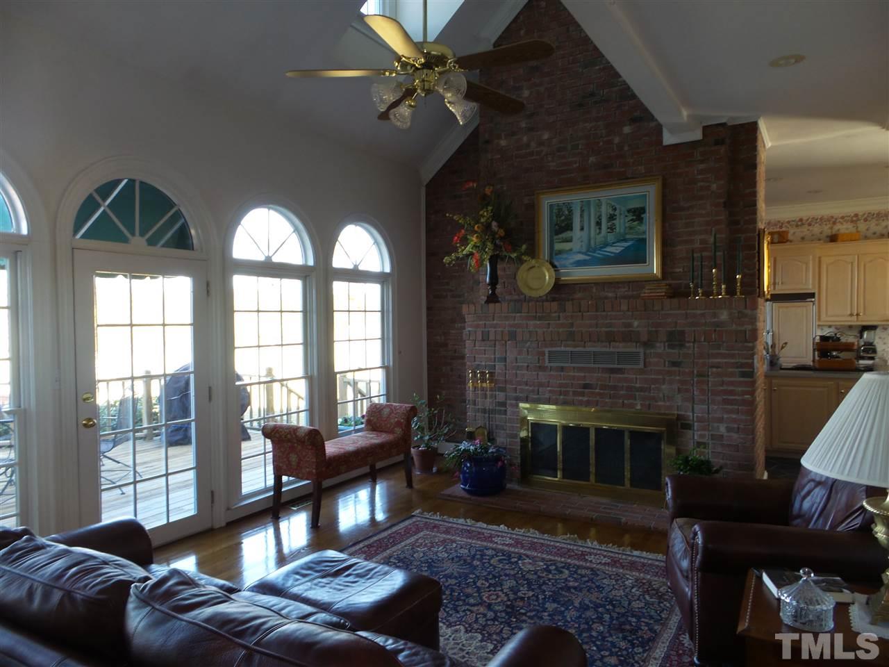 2915 Green Path Road Dunn, NC 28334 - Photo 4 of 24 a living room with furniture and a fireplace