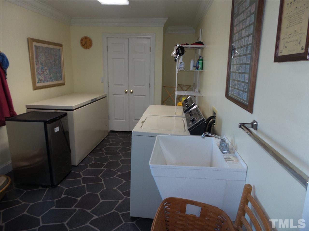 2915 Green Path Road Dunn, NC 28334 - Photo 9 of 24 a bathroom with a sink and a mirror