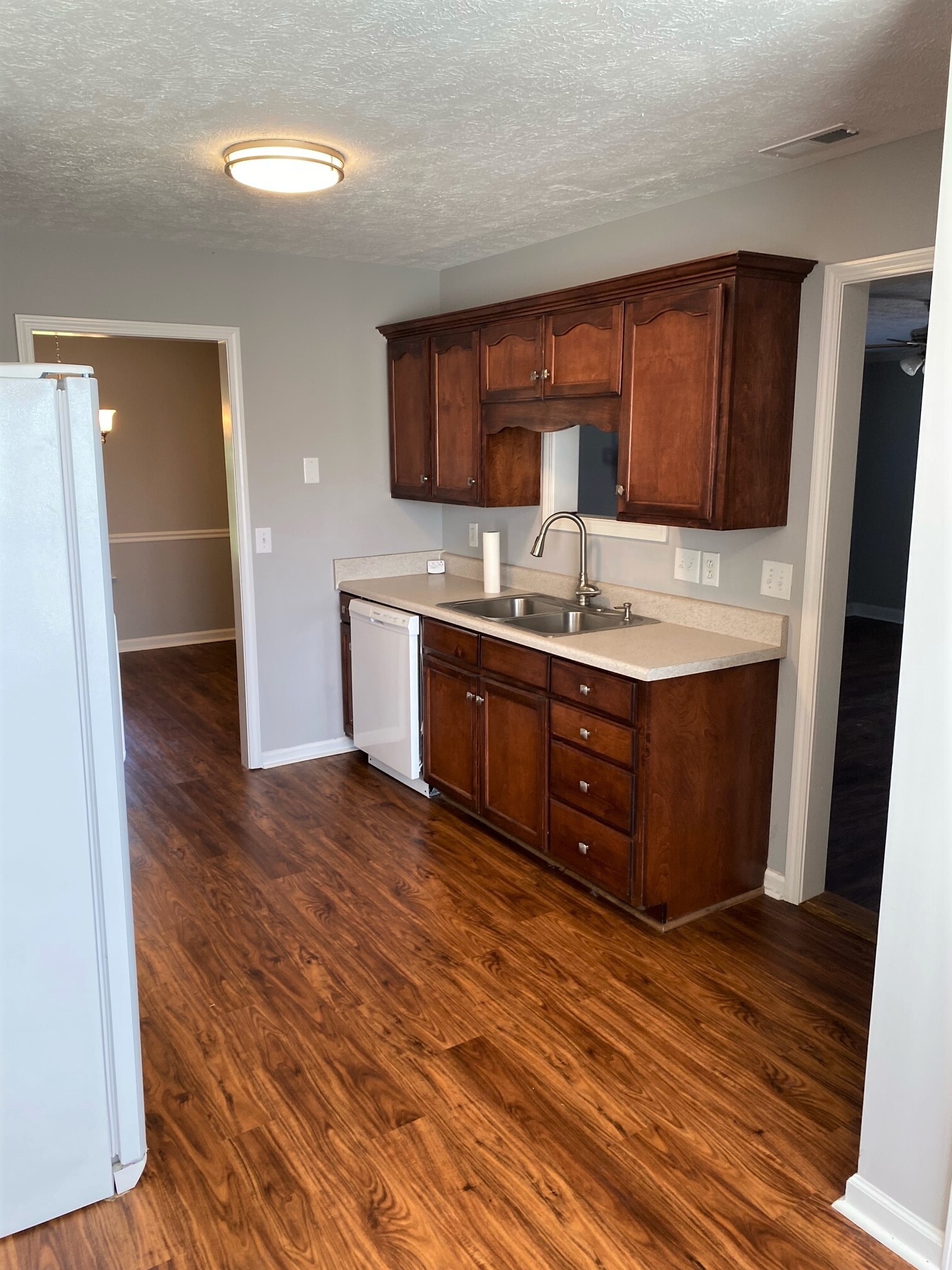 3016 Florence Road Murfreesboro, TN 37129 - Photo 5 of 7 a kitchen with a sink and a refrigerator