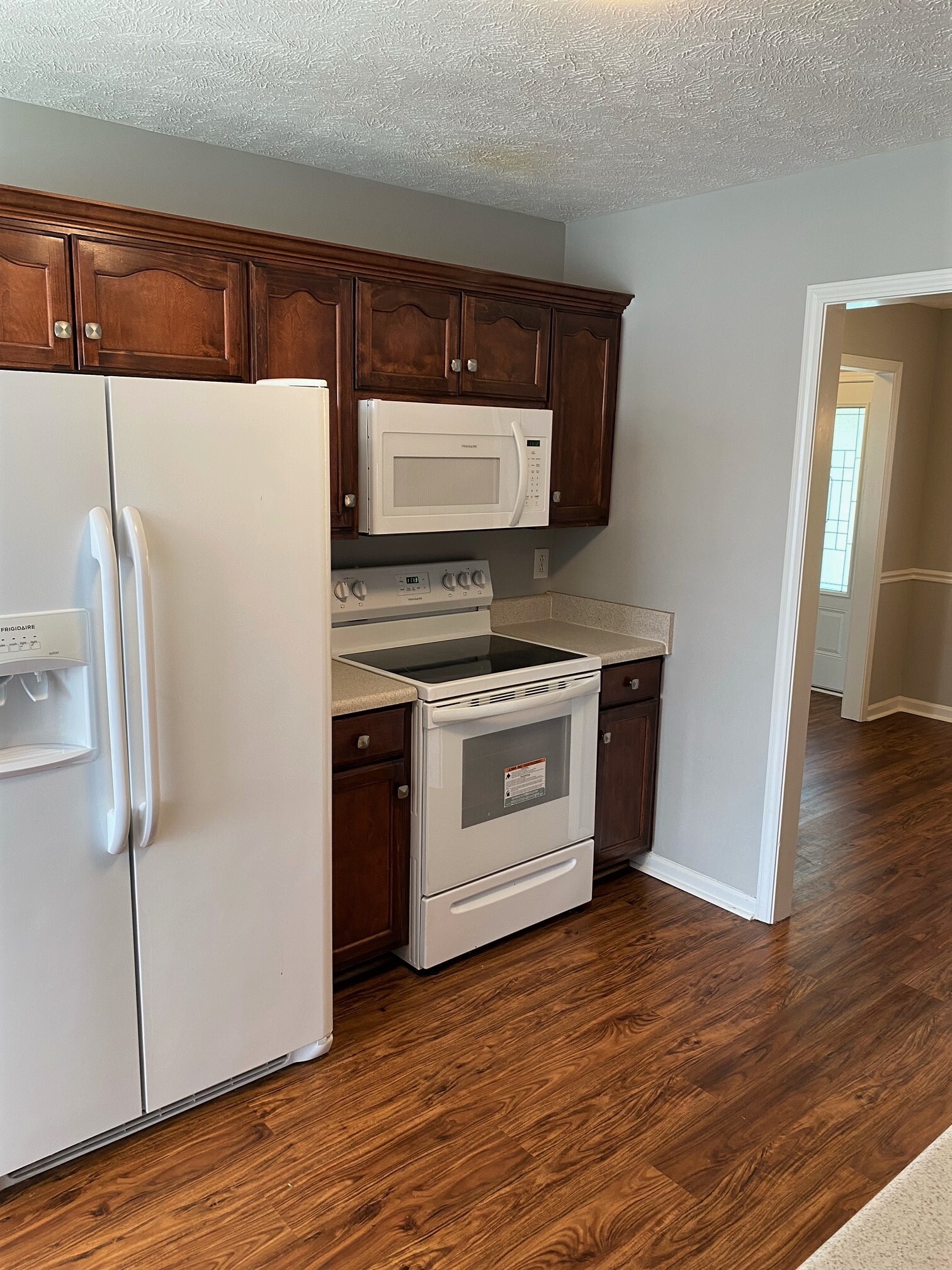 3016 Florence Road Murfreesboro, TN 37129 - Photo 6 of 7 a kitchen with a stove refrigerator and microwave