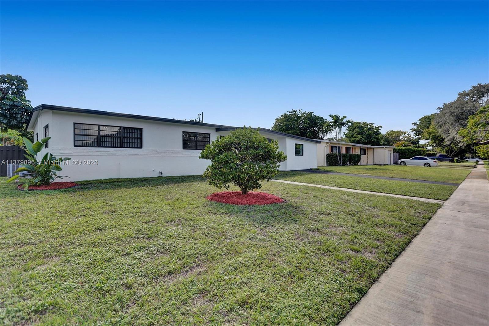 6842 Northwest 13th Street Plantation, FL 33313 - Photo 2 of 33 a view of a backyard