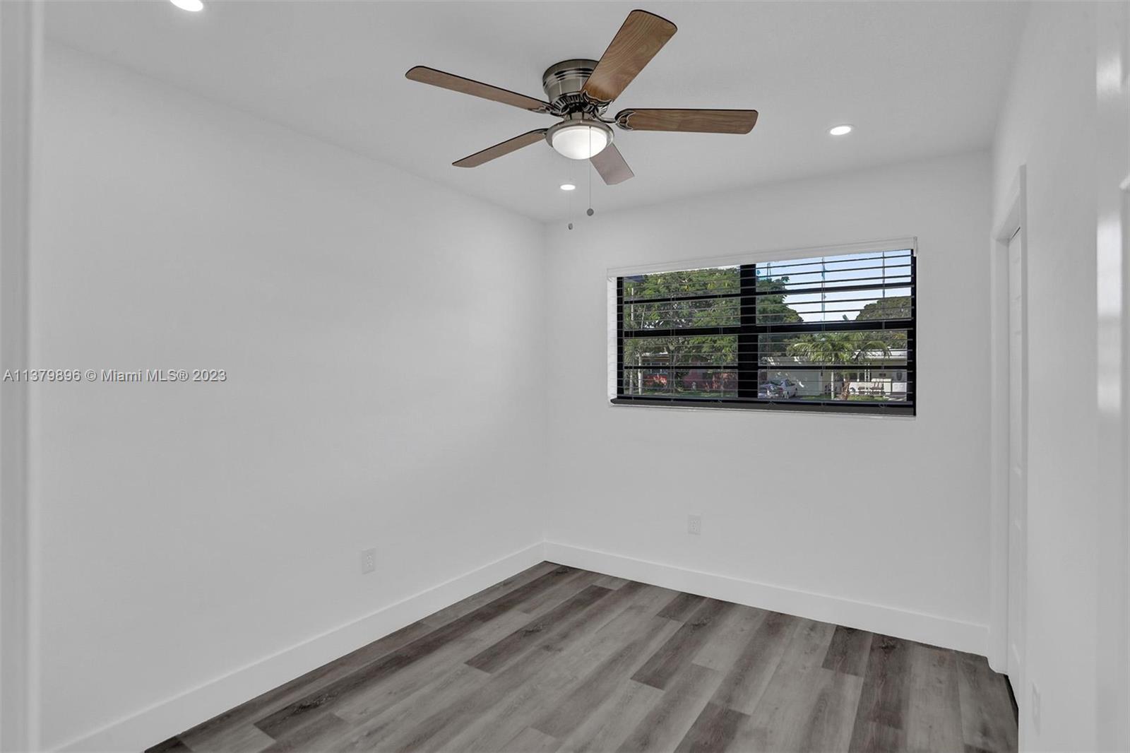 6842 Northwest 13th Street Plantation, FL 33313 - Photo 22 of 33 an empty room with closet