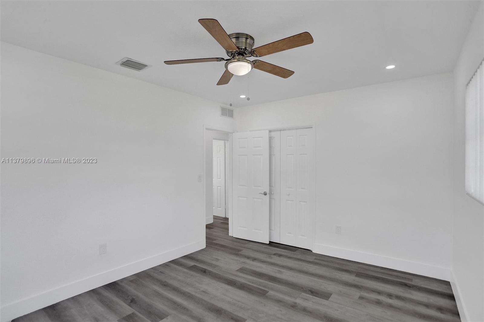 6842 Northwest 13th Street Plantation, FL 33313 - Photo 25 of 33 a view of an empty room