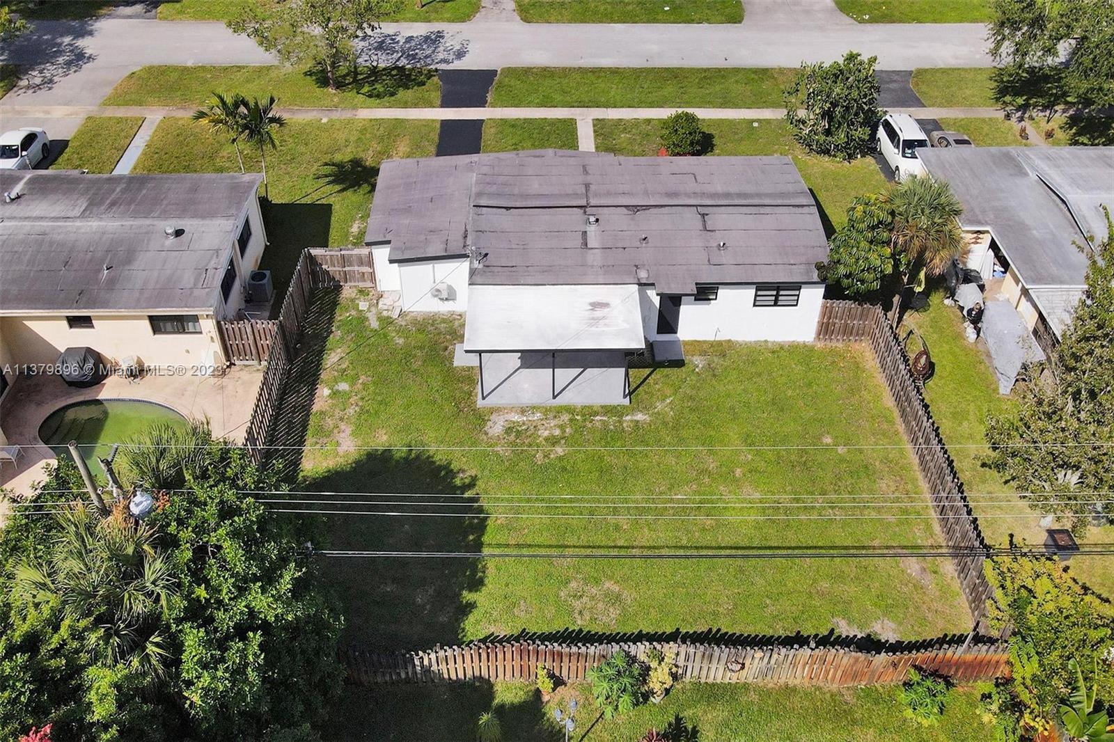 6842 Northwest 13th Street Plantation, FL 33313 - Photo 30 of 33 an aerial view of a house with a yard