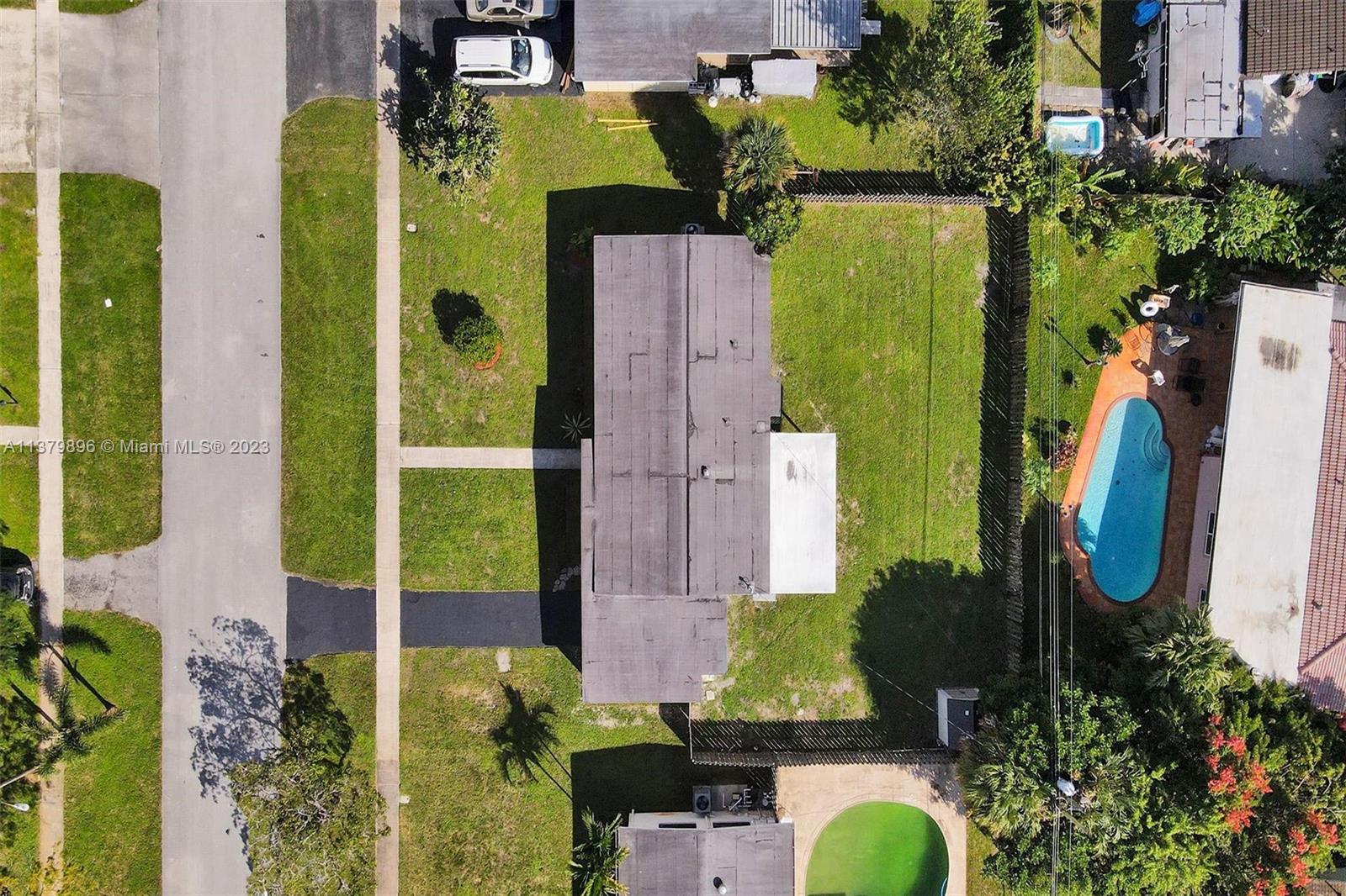 6842 Northwest 13th Street Plantation, FL 33313 - Photo 33 of 33 an aerial view of residential house with outdoor space and swimming pool