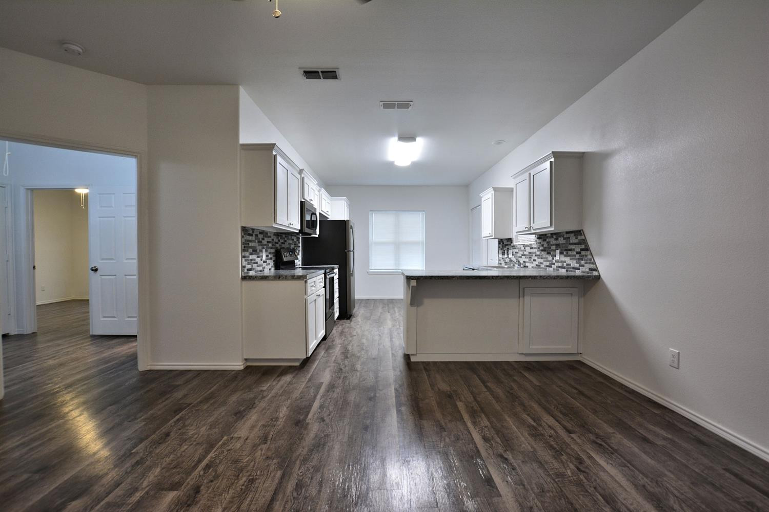 1327 94th Street, Unit A Lubbock, TX 79423 - Photo 4 of 26 Photo 4
