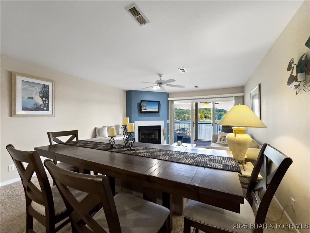 133 Cedar Glen Court, Unit 3D Camdenton, MO 65020 - Photo 7 of 46 Great table for dinner, cards, or game night.