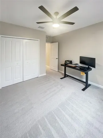 a view of a livingroom with furniture