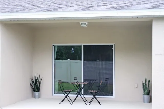 a potted plant sitting on top of a window