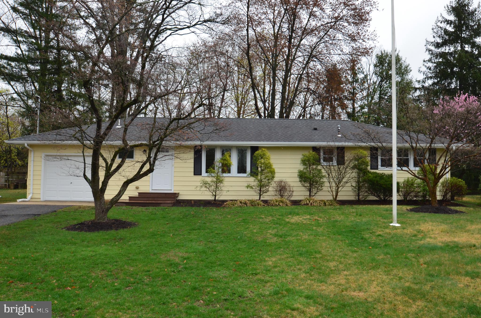 49 Wallace Road Princeton Junction, NJ 08550 - Photo 2 of 32 a front view of a house with a garden