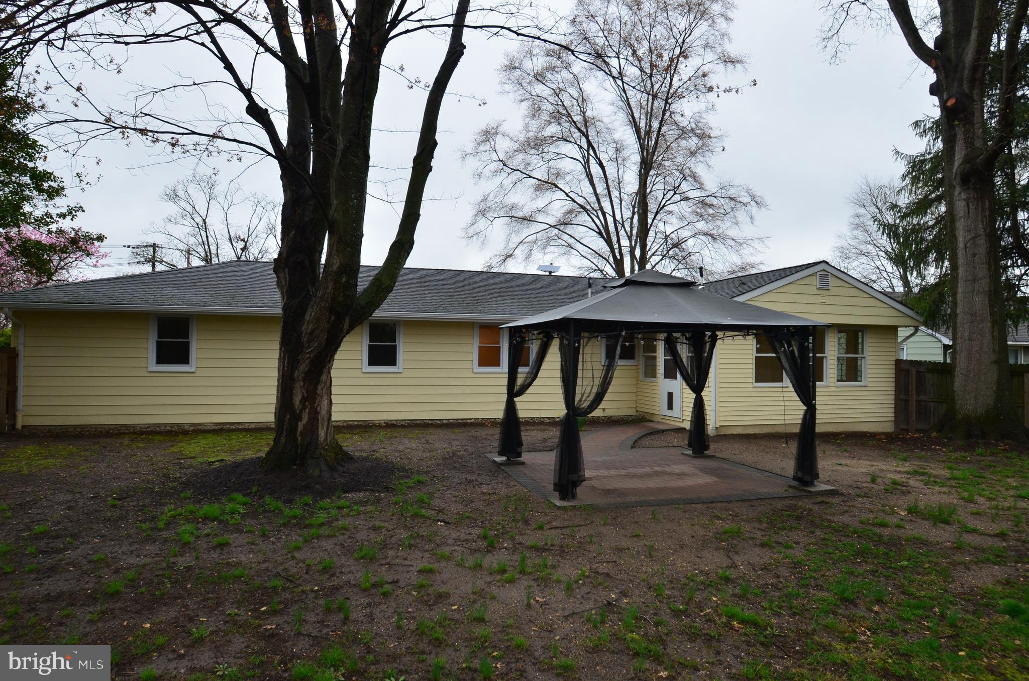 49 Wallace Road Princeton Junction, NJ 08550 - Photo 21 of 32 a view of a house with a yard