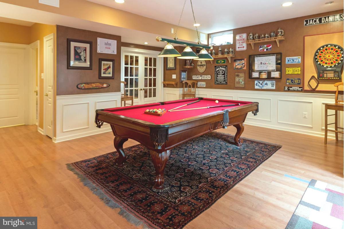 8511 Springway Road Ellicott City, MD 21043 - Photo 21 of 30 Theater area, pool area, gaming area & bar