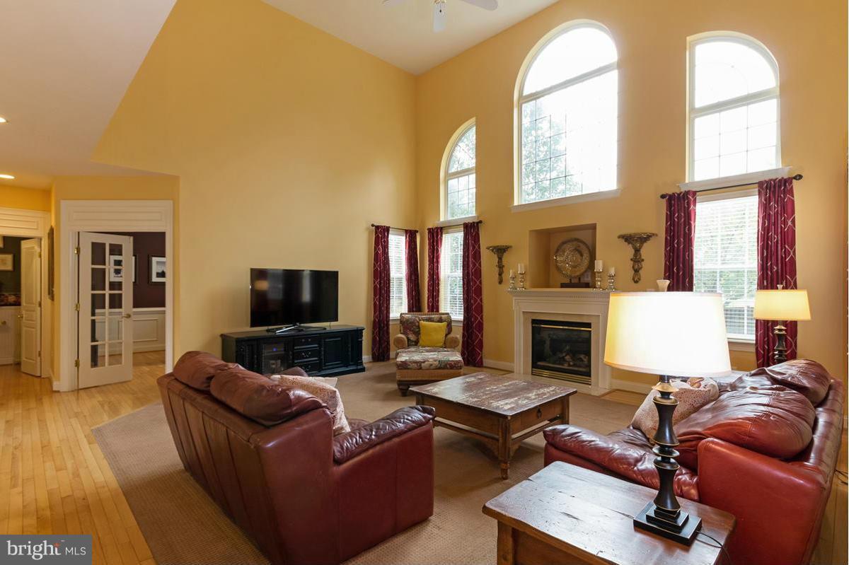 8511 Springway Road Ellicott City, MD 21043 - Photo 6 of 30 2 story Family Room gas FP Palladium windows