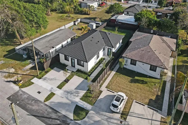 an aerial view of a house with a garden view