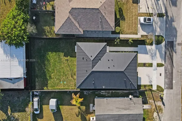 an aerial view of a city with lots of residential buildings