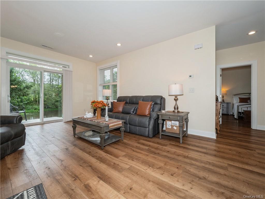 6-8 Wilbur Road Pleasant Valley, NY 12569 - Photo 8 of 36 Living room with hardwood / wood-style floors and a healthy amount of sunlight