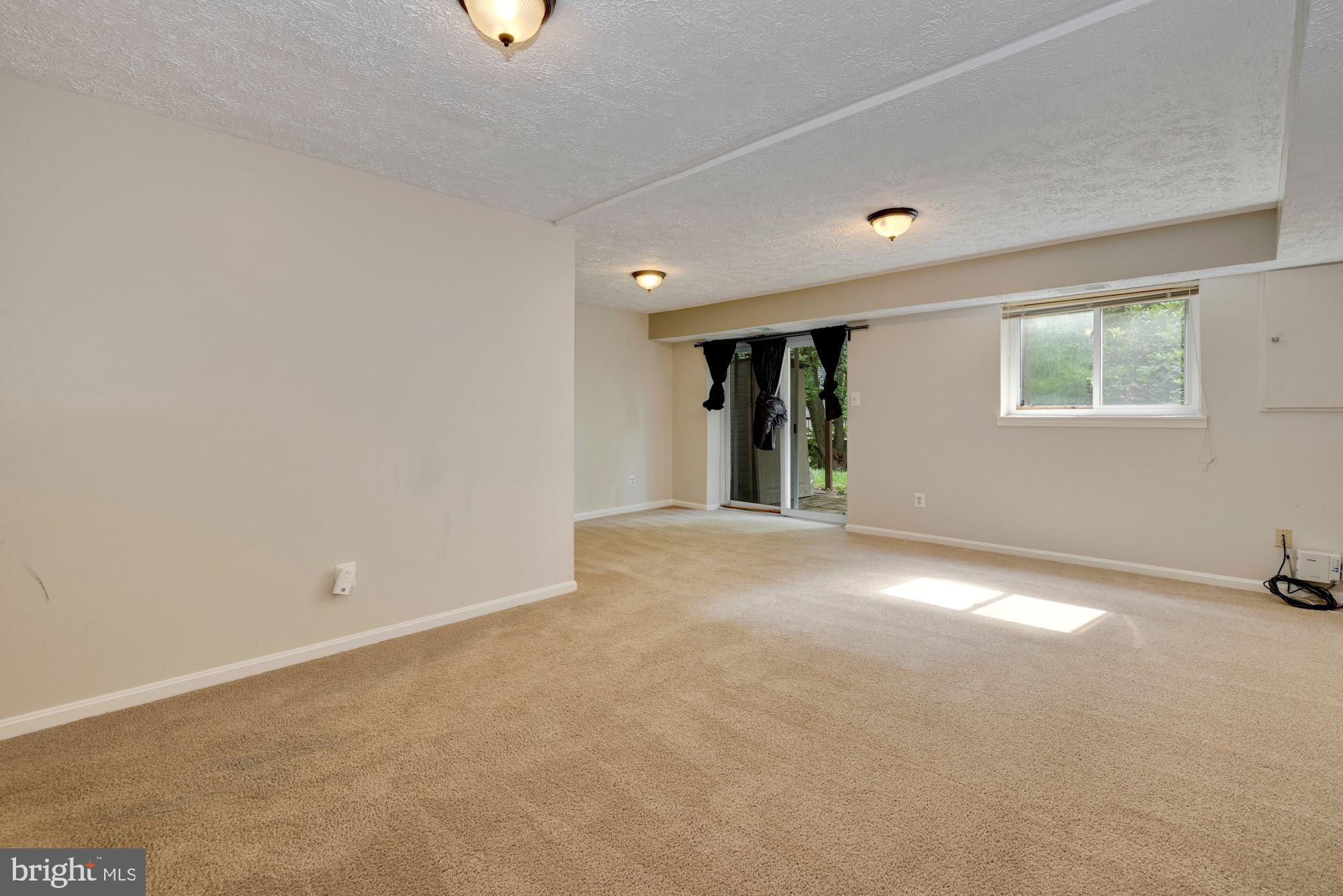 1721 Logmill Lane Gaithersburg, MD 20879 - Photo 21 of 34 Basement Family Room