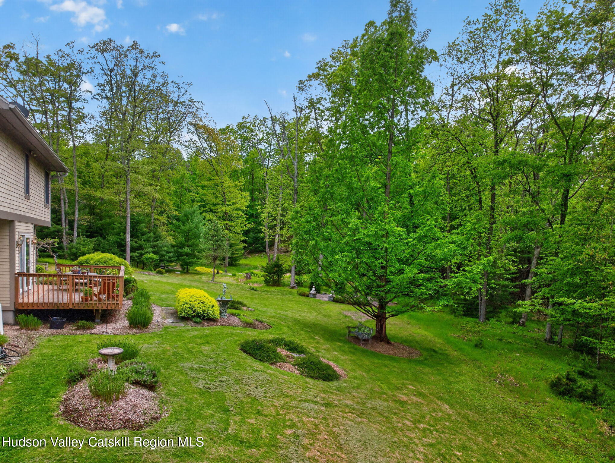 189 Bush Road Stone Ridge, NY 12484 - Photo 55 of 60 a view of a garden with large trees