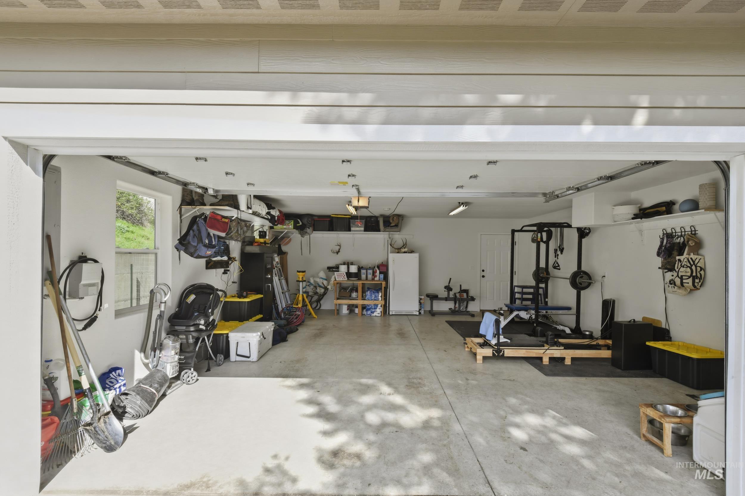 301 State Street Juliaetta, ID 83535 - Photo 32 of 41 Garage with freestanding refrigerator