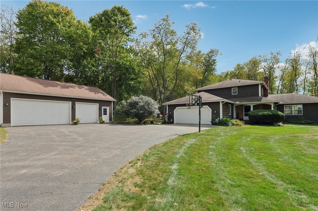 16737 Claridon Troy Road Burton, OH 44021 - Photo 1 of 46 Set far off the road on a paved driveway this well constructed home also offers an additional 3 car garage