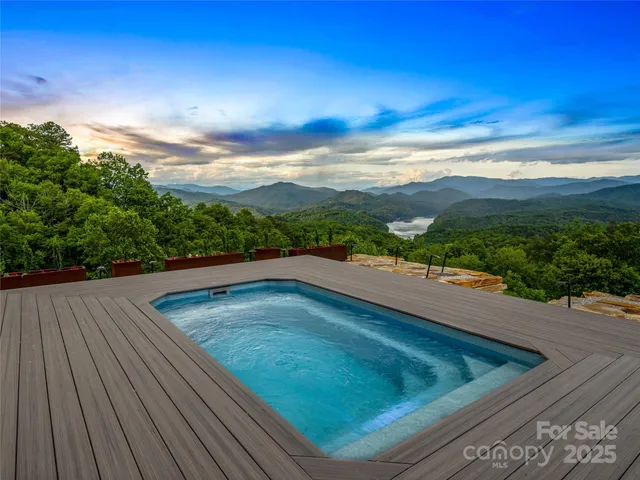 a view of a yard with an ocean view