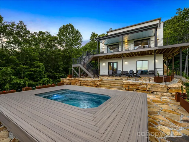 a front view of a house with swimming pool