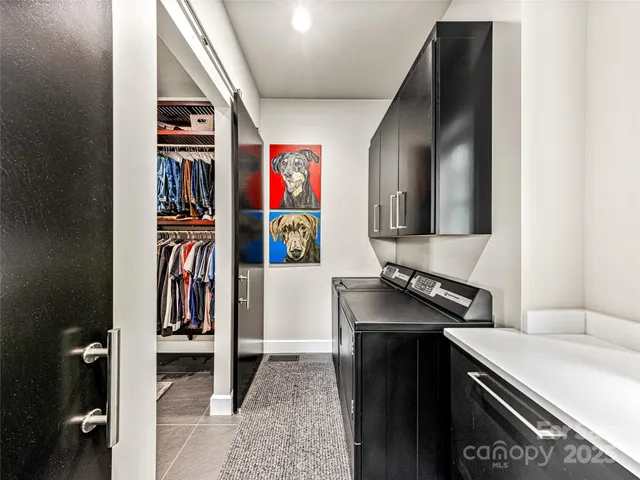 a bathroom with a sink vanity and a toilet