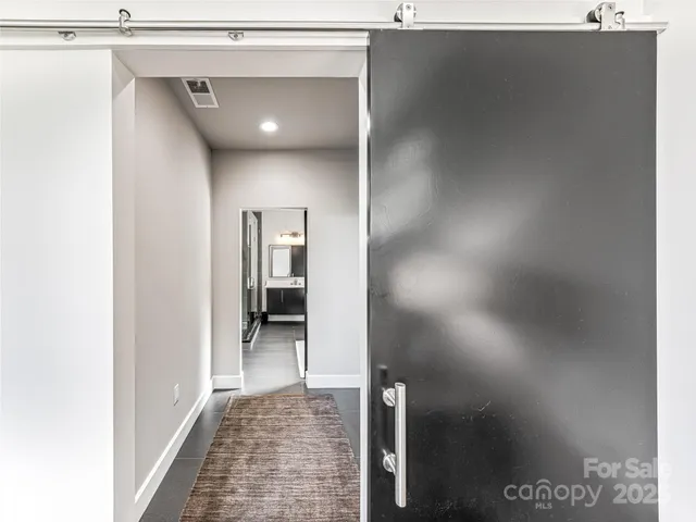 a bathroom with a tub and a shower