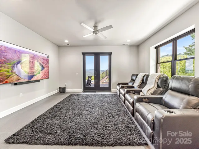 a view of a chairs and table in backyard