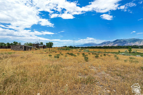 19 East Southfield Road Spanish Fork, UT 84660 - Photo 45 of 74 View of mountain background featuring rural landscape