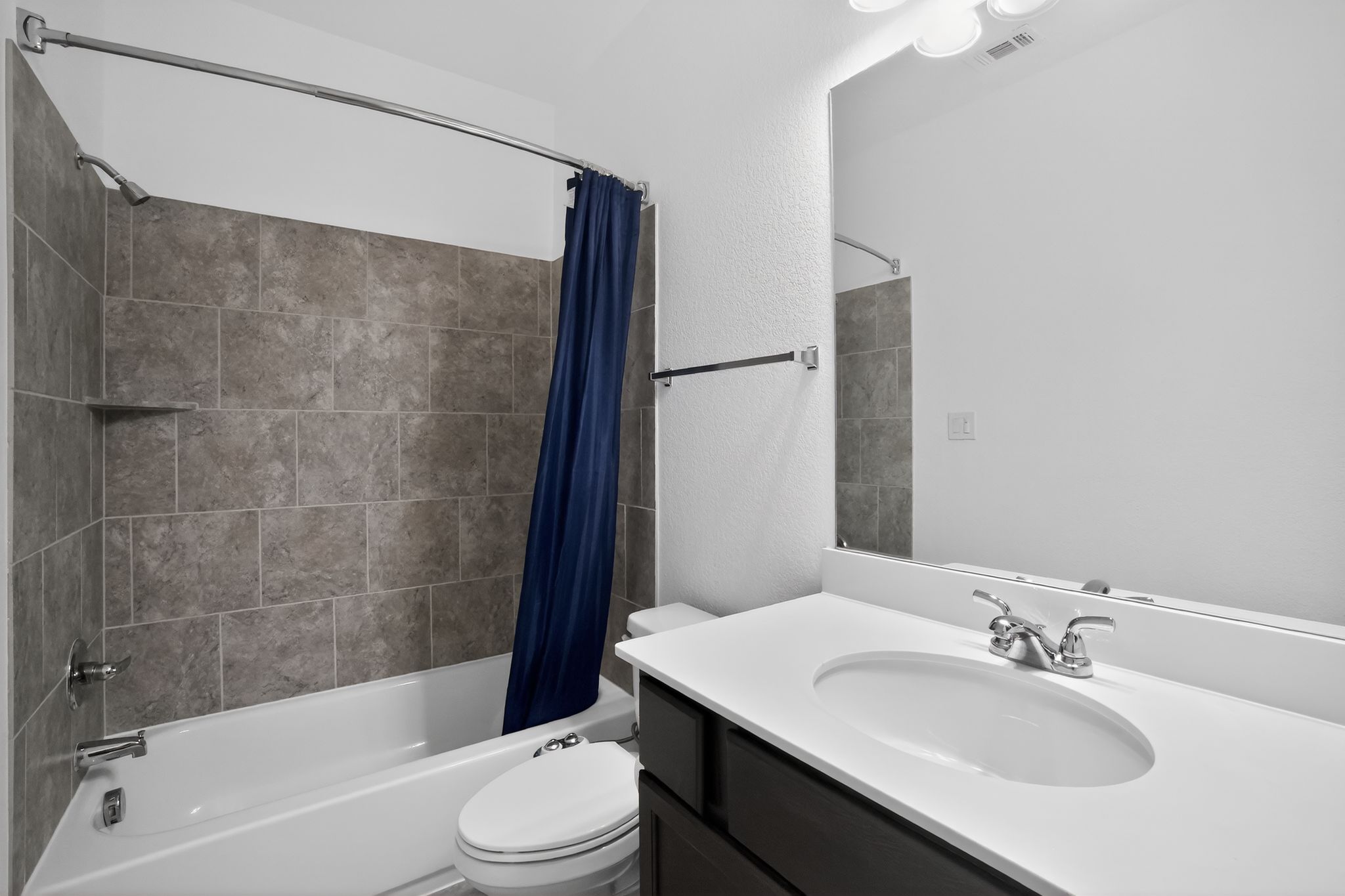 400 Cortona Lane Georgetown, TX 78628 - Photo 31 of 40 Bathroom with vanity and shower / tub combo