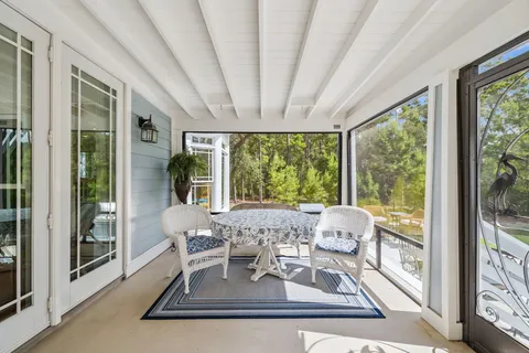 a view of a park with large trees