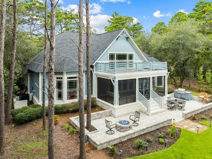 a view of a park with large trees