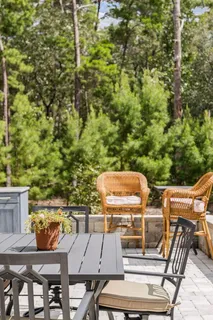 a bedroom with bed and painting on the wall