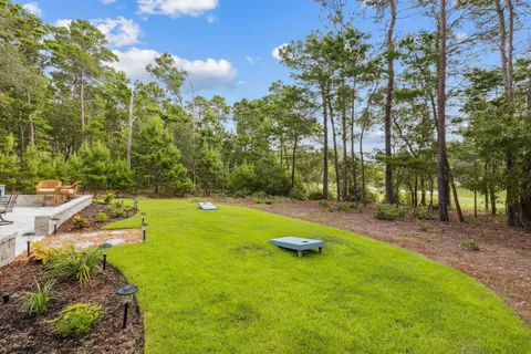 a bathroom with a tub and a window