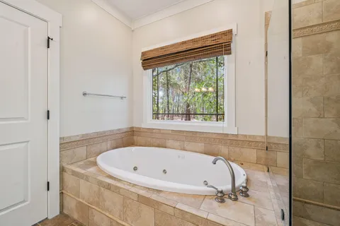 a front view of house with yard and outdoor seating