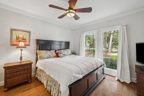 a swimming pool with outdoor seating and yard