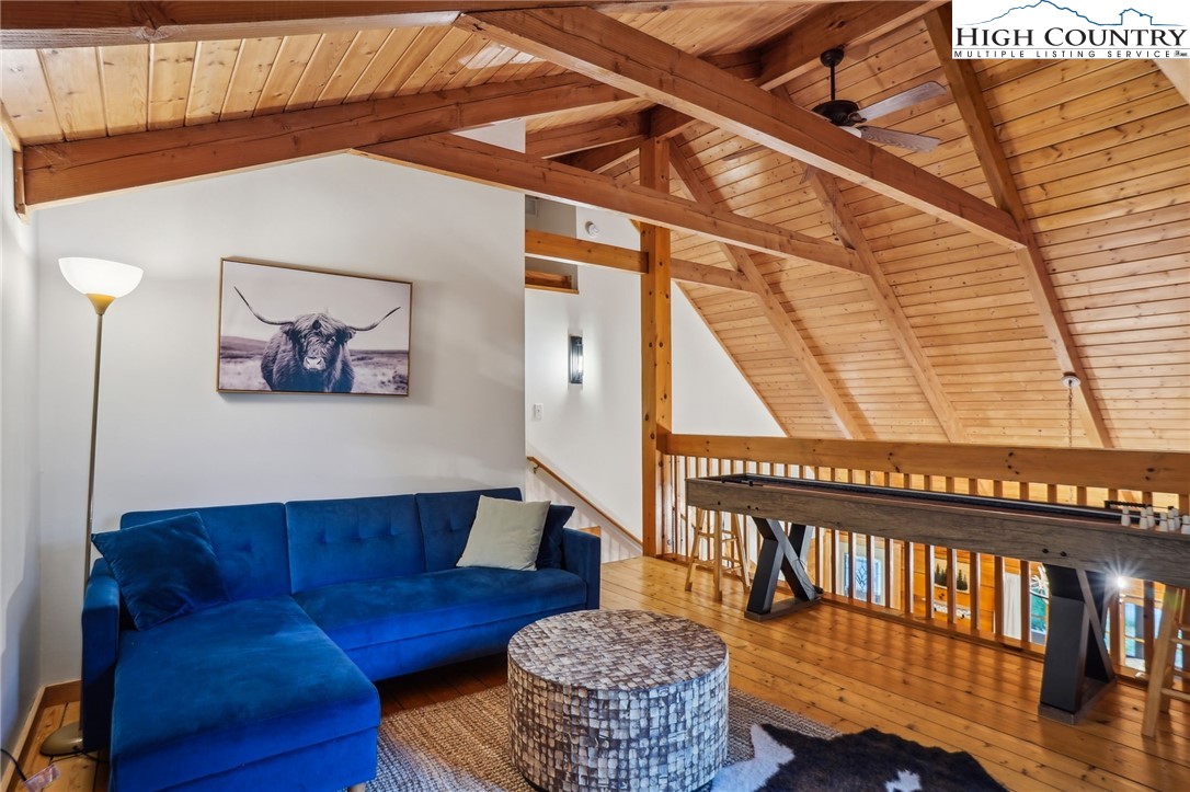 909 Niley Cook Road Blowing Rock, NC 28605 - Photo 12 of 45 a living room with furniture and a window