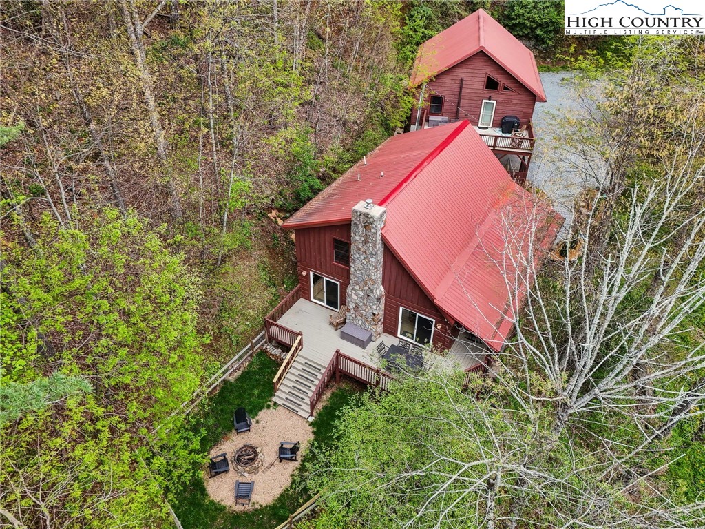 909 Niley Cook Road Blowing Rock, NC 28605 - Photo 2 of 45 an aerial view of a house with yard and trees
