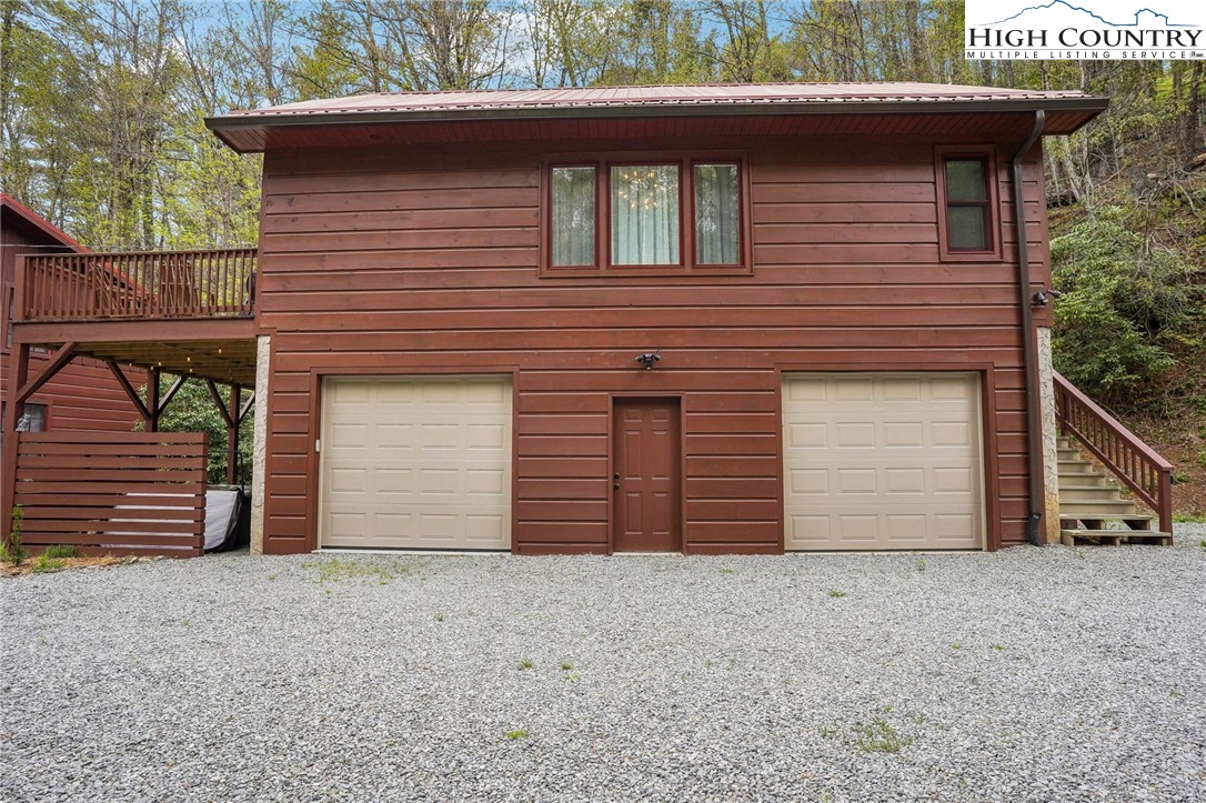 909 Niley Cook Road Blowing Rock, NC 28605 - Photo 26 of 45 a view of a house with a garage