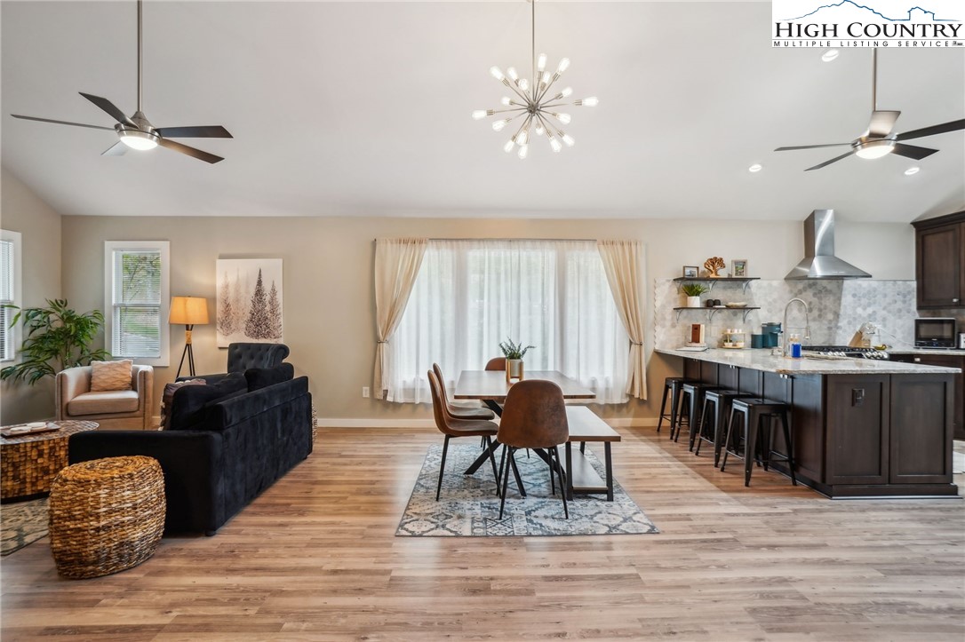 909 Niley Cook Road Blowing Rock, NC 28605 - Photo 29 of 45 a living room with furniture and a wooden floor