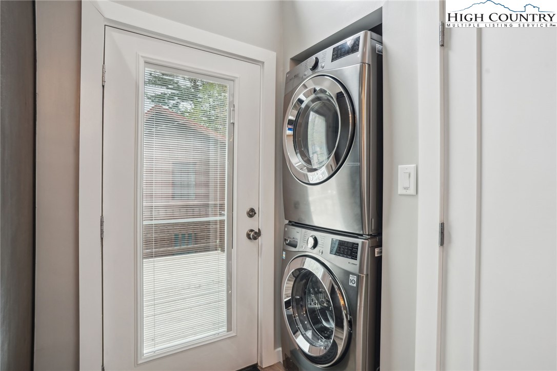 909 Niley Cook Road Blowing Rock, NC 28605 - Photo 32 of 45 a utility room with dryer and washer