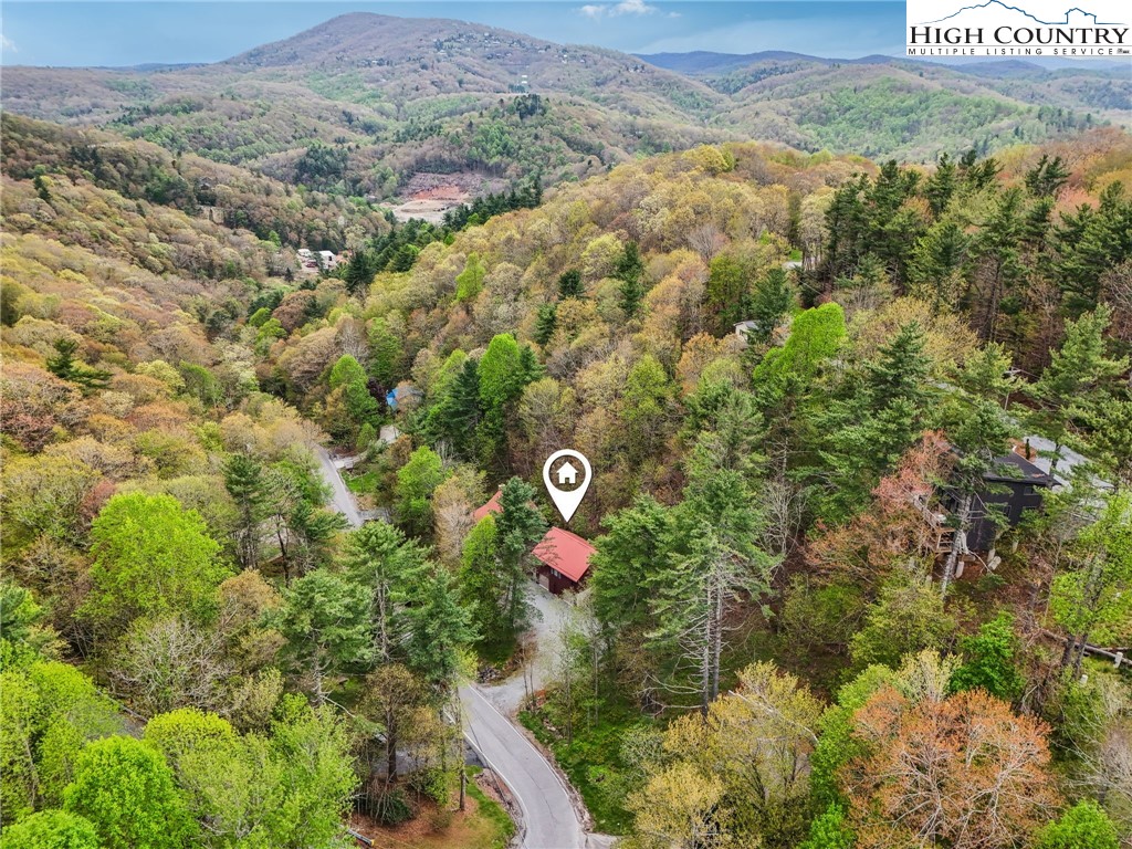 909 Niley Cook Road Blowing Rock, NC 28605 - Photo 42 of 45 a view of aerial view of residential house with parking space and sign board